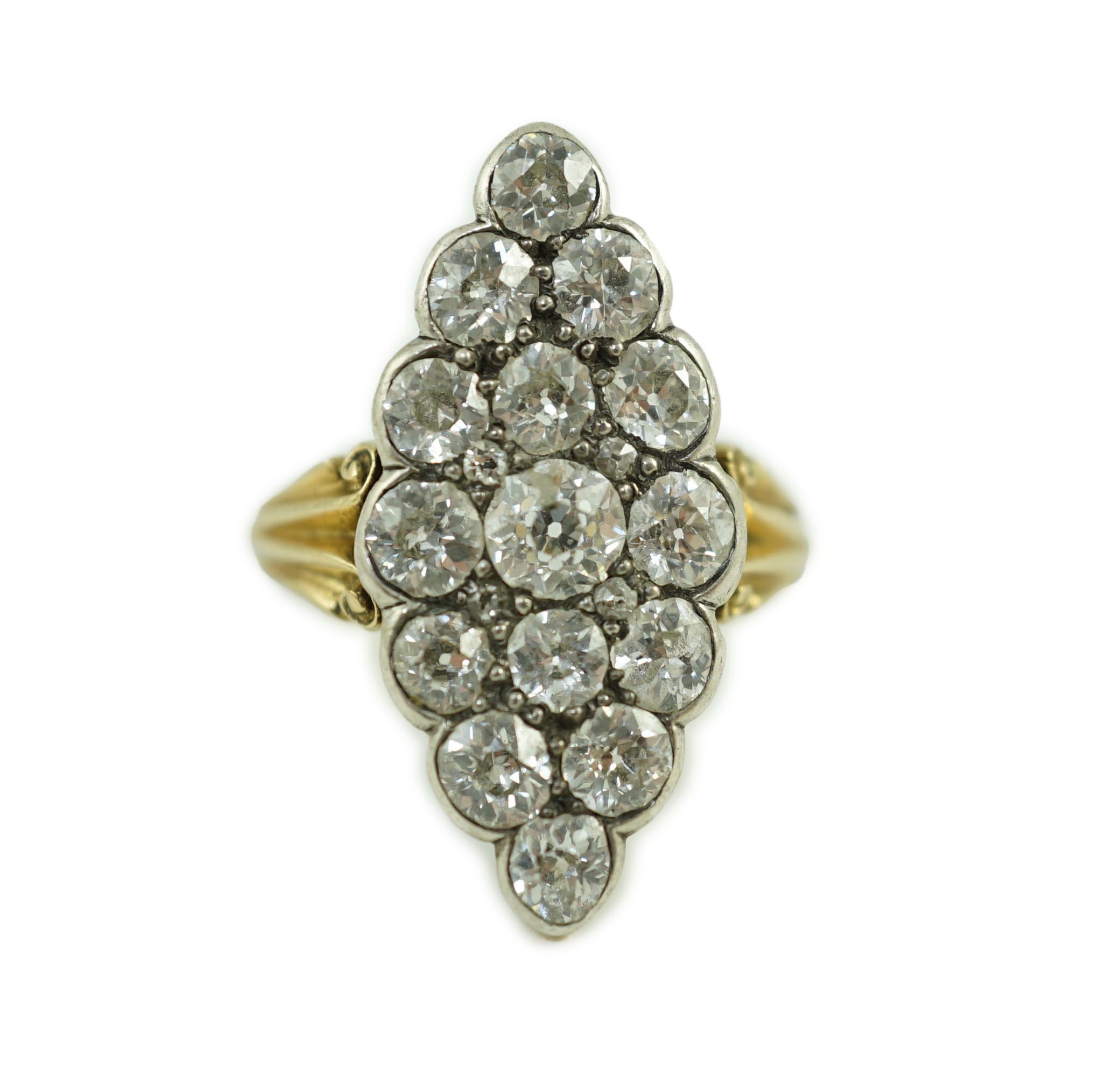A Victorian style 18ct gold and fifteen stone diamond set marquise cluster dress ring
